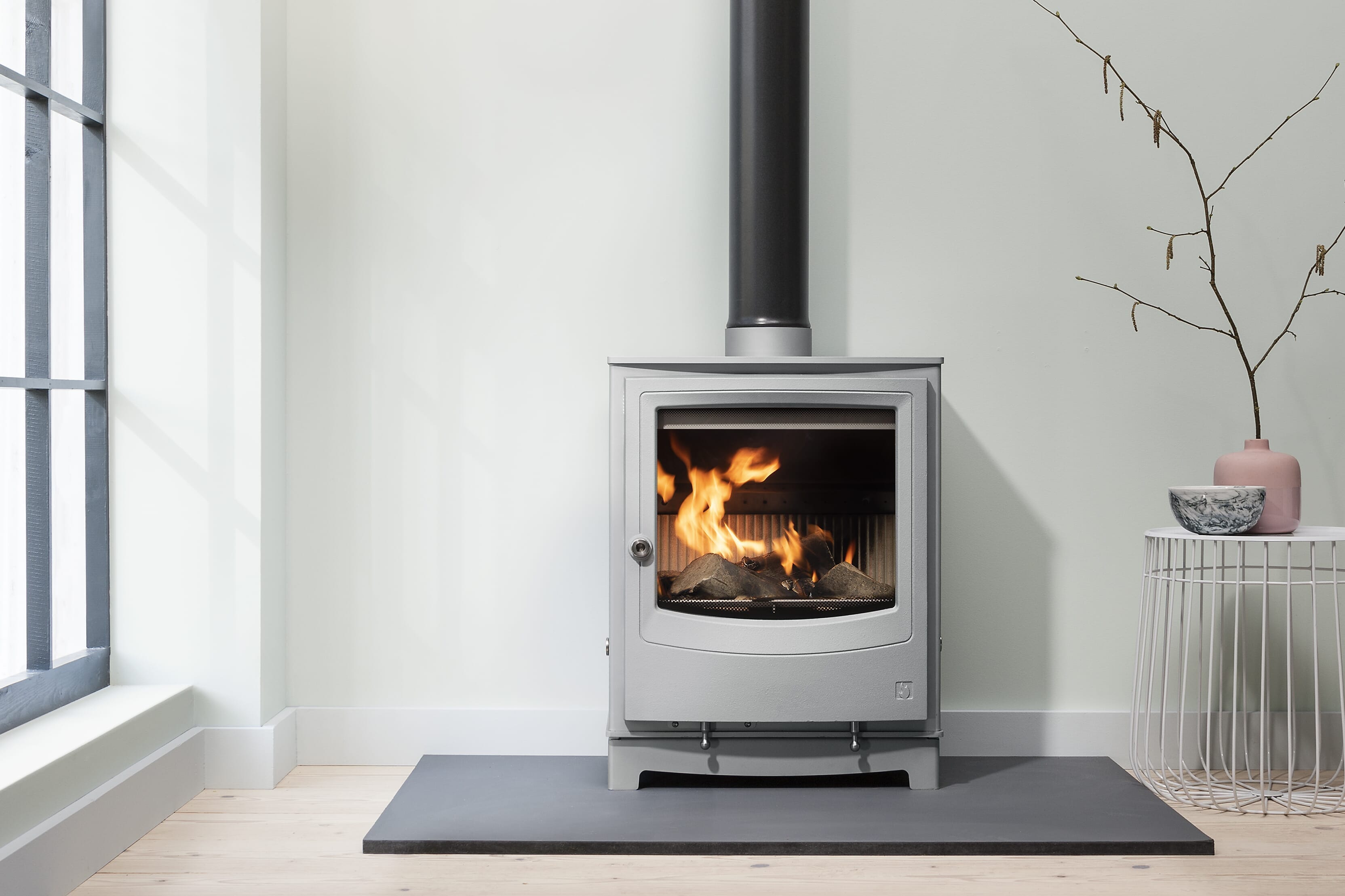 Arada Farringdon Small Eco multifuel stove shown in optional Mist colourway